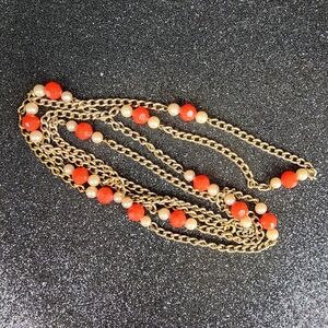 Elegant Gold and Red Beaded Necklace